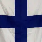 Close-up view of nautical signal flag letter X showing fabric texture and seam detail