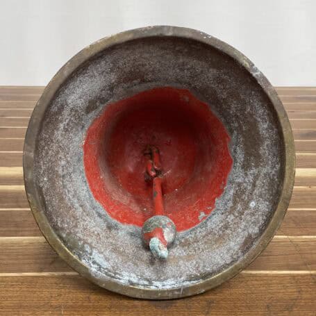 Salvaged Brass Bell - MV KANPUR 01 showing the red paint in the MV KANPUR bell