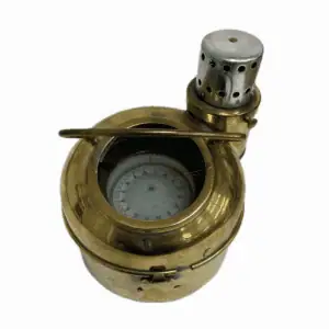 Close-up of compass from salvaged brass housing
