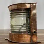 Large copper nautical light side view with conduit fitting