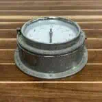 Top Angle: Top-down view of ship clock showing outer rim and dial layout