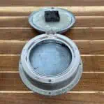 Open Showing Clock Mechanism: Clock opened to reveal battery-powered mechanism inside