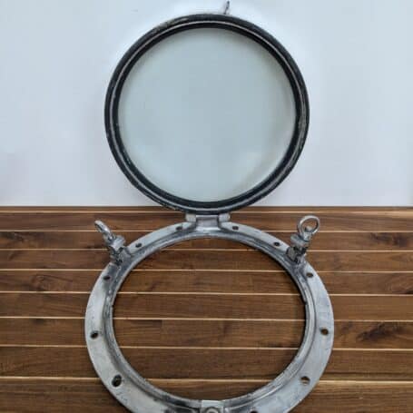 Aluminum Porthole Window 21 inch Diameter 06 21" Aluminum Porthole Window - Opened View Showing Hinges and Interior Frame