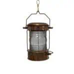 Copper lantern set – hanging view with clear Fresnel lens and brass hardware
