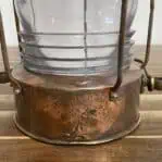 Copper lantern set – close-up of lower body with weathered copper texture