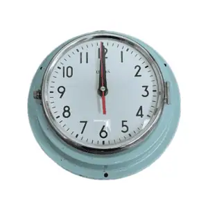 Blue Citizen vintage nautical clock with chrome bezel and white background