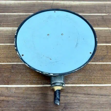 Main view: Main view of nautical clock with original conduit wiring, showing white dial and chrome-rimmed face