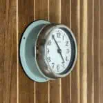 Side Angle 2: Angled view of nautical wall clock with original wiring