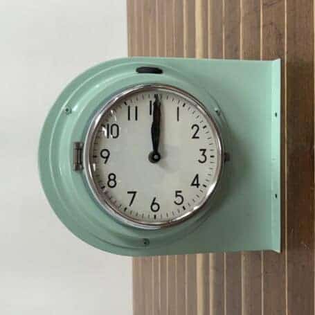 Salvaged Double-Sided Ship Clock by Citizen (2) Profile view: Wall-mounted Salvaged Double-Sided Ship Clock with 5.5-inch dials visible