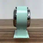 Side angle of the Salvaged Seafoam Double-Sided Ship Clock, showing its vintage nautical design.