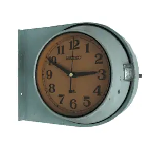 Seiko Double-Sided Nautical Wall Clock with light blue-green metal frame and tan faces with black numerals.
