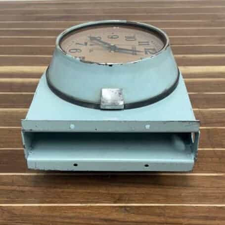 Seiko Double-Sided Nautical Wall Clock - Light Blue-Green Underside of the nautical clock showing the secure four-hole mounting bracket for wall installation.