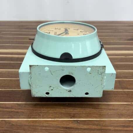 Seiko Double-Sided Ship Clock - Seafoam Finish (3) Close-up of the four-hole mounting bracket for secure wall installation.