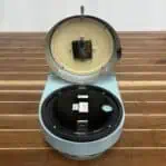 Tricolor Seiko Double-Sided Wall Clock with one side open for battery access
