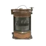 Isolated product photo of vintage copper starboard navigation light on white background.