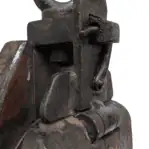 Close-up of pulley hardware showing metal latch and wood