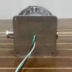 Bottom of the aluminum post light showing 4.75-inch square base and wiring