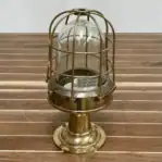 Close-up side angle showing brass detail and glass globe