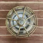 Brass cage and glass globe viewed from the top