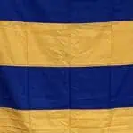Close-up of fabric detail on letter G signal flag with alternating blue and yellow stripes