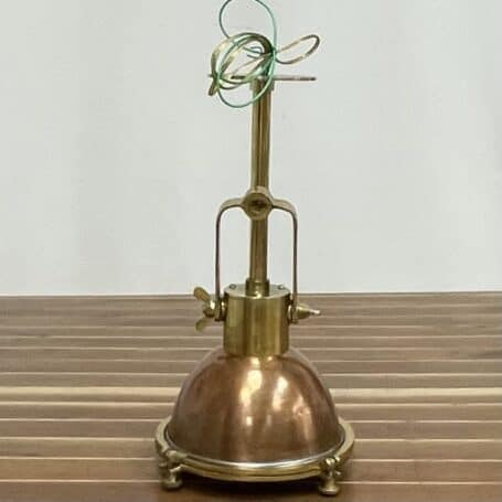 Salvaged-Marine-Pendant-Brass-and-Patinated-Copper-Light-2 Top-down angle showing brass rod and handle on salvaged marine pendant