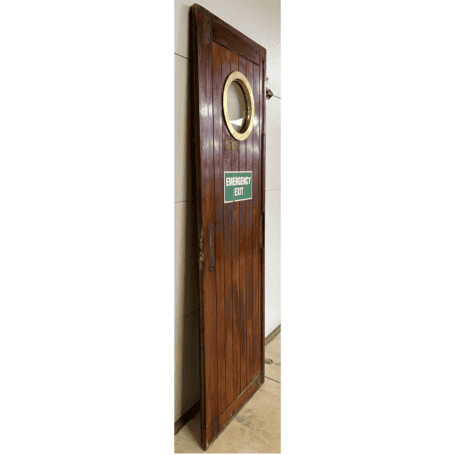 Salvaged Ship Door with Porthole (4) Side view of vintage wooden ship door showing thickness and plank construction