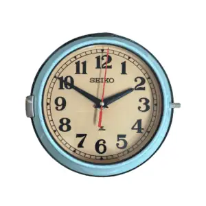 Main image: Vintage Seiko ship clock with tan face and blue-grey enamel housing