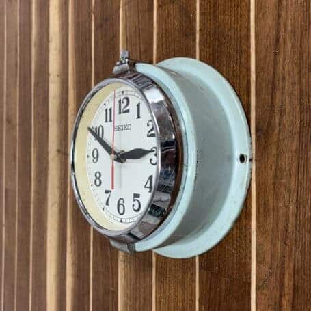 Seiko Seafoam Wall Slave Clock - Battery Operated, 1990s (2) Side angle of Seiko Seafoam Wall Slave Clock showing enamel body and corrosion