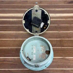 Vintage Seiko industrial wall clock with steel housing and chrome bezel
