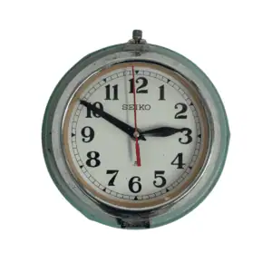 Main view of vintage Seiko slave clock mounted on wall