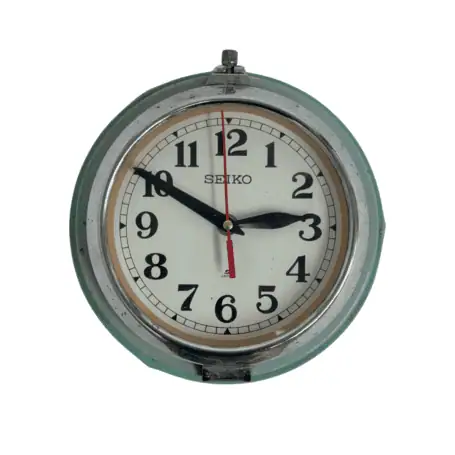 Main view of vintage Seiko slave clock mounted on wall