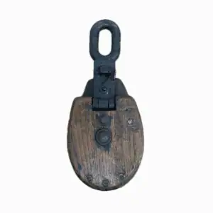 Vintage wooden pulley with metal hardware and weathered finish
