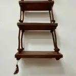 Upward View from Bottom Showing Underside of Steps and Rope Ends