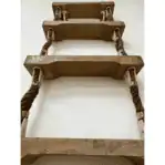 Looking up from bottom: Low-angle view of ladder steps and rope ends