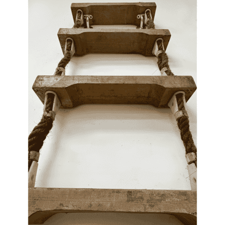 5-Step Wood Nautical Ladder (3) Looking up from bottom: Low-angle view of ladder steps and rope ends