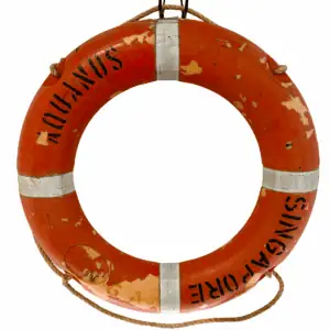 Front view of Salvaged Aquanus Ship Life Ring with orange paint and white lettering