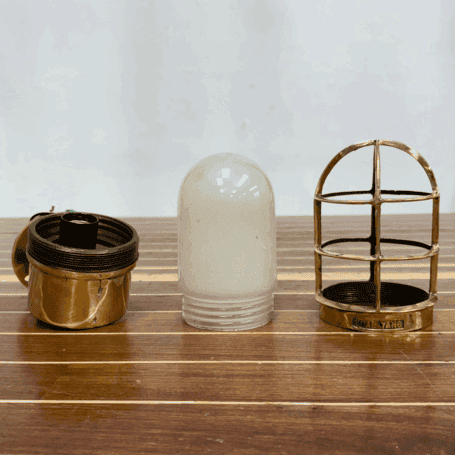 Solid Brass Dock Light with Frosted Glass Globe (7) Light disassembled with brass housing and frosted globe laid out