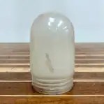 Solid brass frosted globe dock light with globe detail in focus