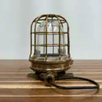 Close-up side view of Vintage 3-Bar Brass Post Light