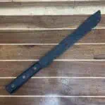 side view of vintage machete with wooden handle salvaged from the Great Lakes