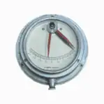 Close-up of vintage nautical clinometer marked Kompas Rijeka Yugoslavia