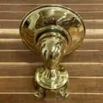 Brass nautical wall sconce side profile showing polished finish