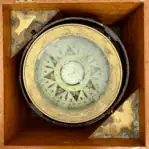 Henry Browne Marine Compass with Stand interior view focusing on compass dial and cardinal points