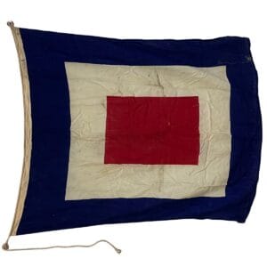 Letter W Whiskey nautical signal flag angled view showing frayed rope edge and marked top rim