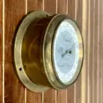 Top-down angle showing brass frame and glass face