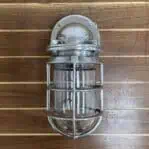Polished aluminum nautical wall light – overhead view