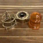 Brass nautical ceiling light with orange glass lens – disassembled view