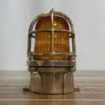 Brass nautical ceiling light with orange decorative glass – side angle