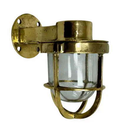 Indoor or outdoor brass wall sconce with patina finish