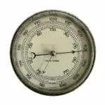 Kelvin Hughes Marine Barometer close-up of cream dial with black markings and compensated scale